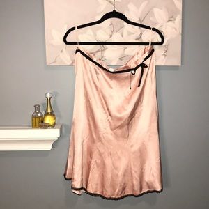 Pink silk skirt with black lace trim